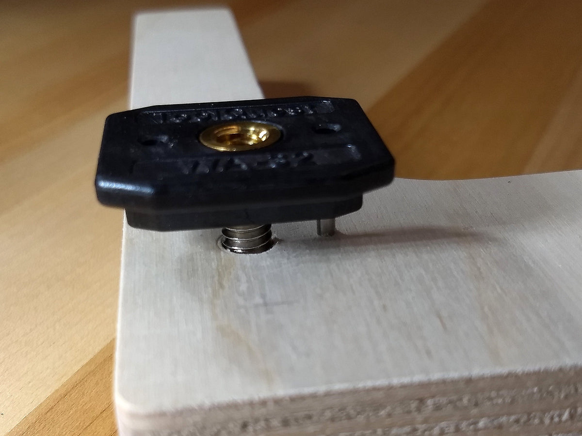 Hornbeam T-nut with an alignment pin installed in a fixture component
