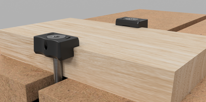 EdgeHugger clamps are used to secure a workpiece. [Specialty]