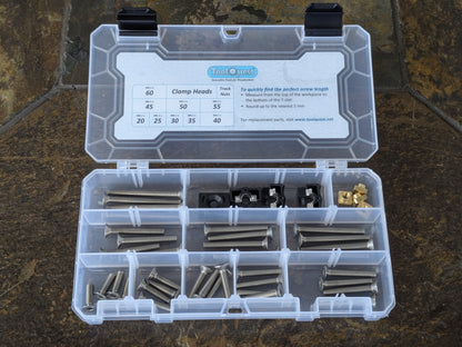 An EdgeHugger CNC Workholding Kit for T-track is shown with its lid open, revealing the organizer-box compartment label and the kit contents.  [T-track]