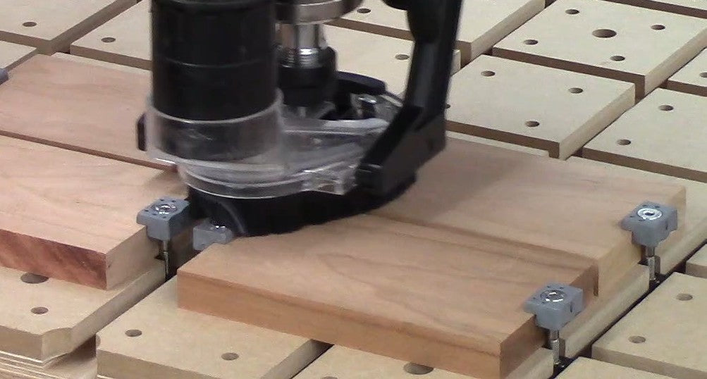 Dust-boot brushes sweep easily across EdgeHugger clamp heads.